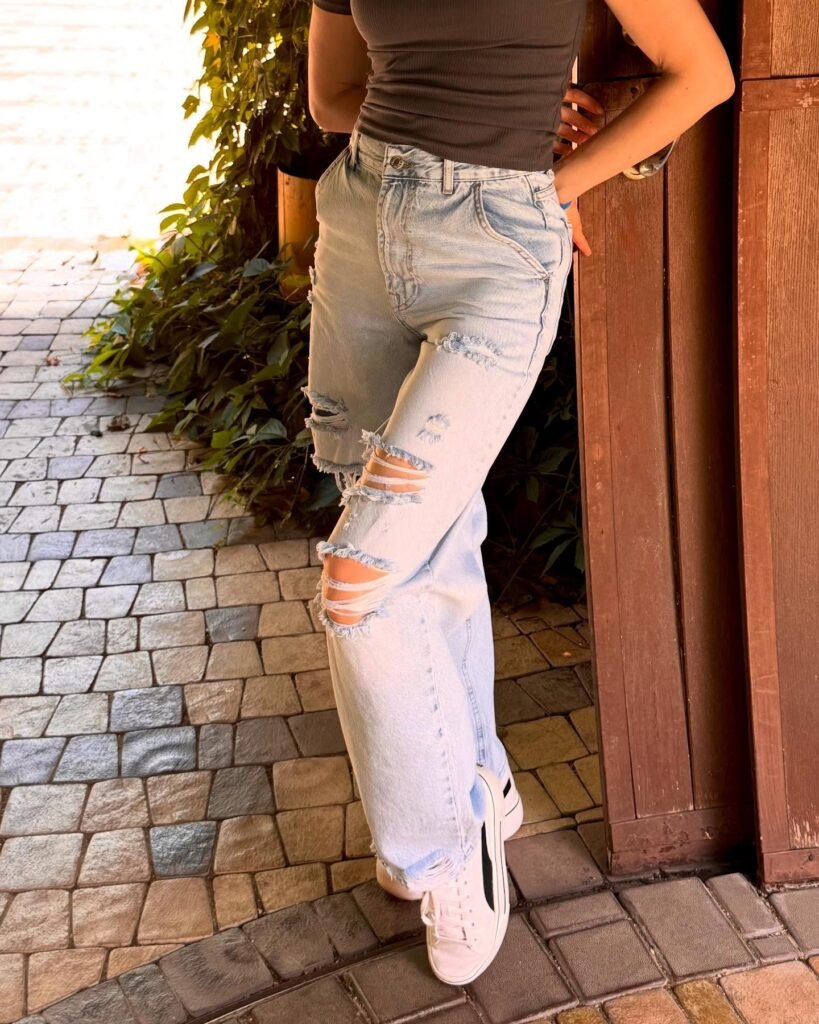 14. Ribbed Tank + Ripped Light Baggy Jeans