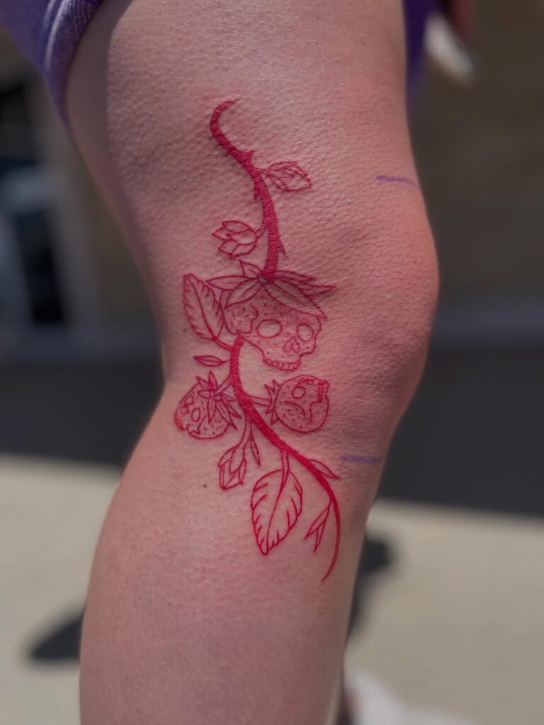2. Strawberry Skulls & Vines: A Red Ink Twist
