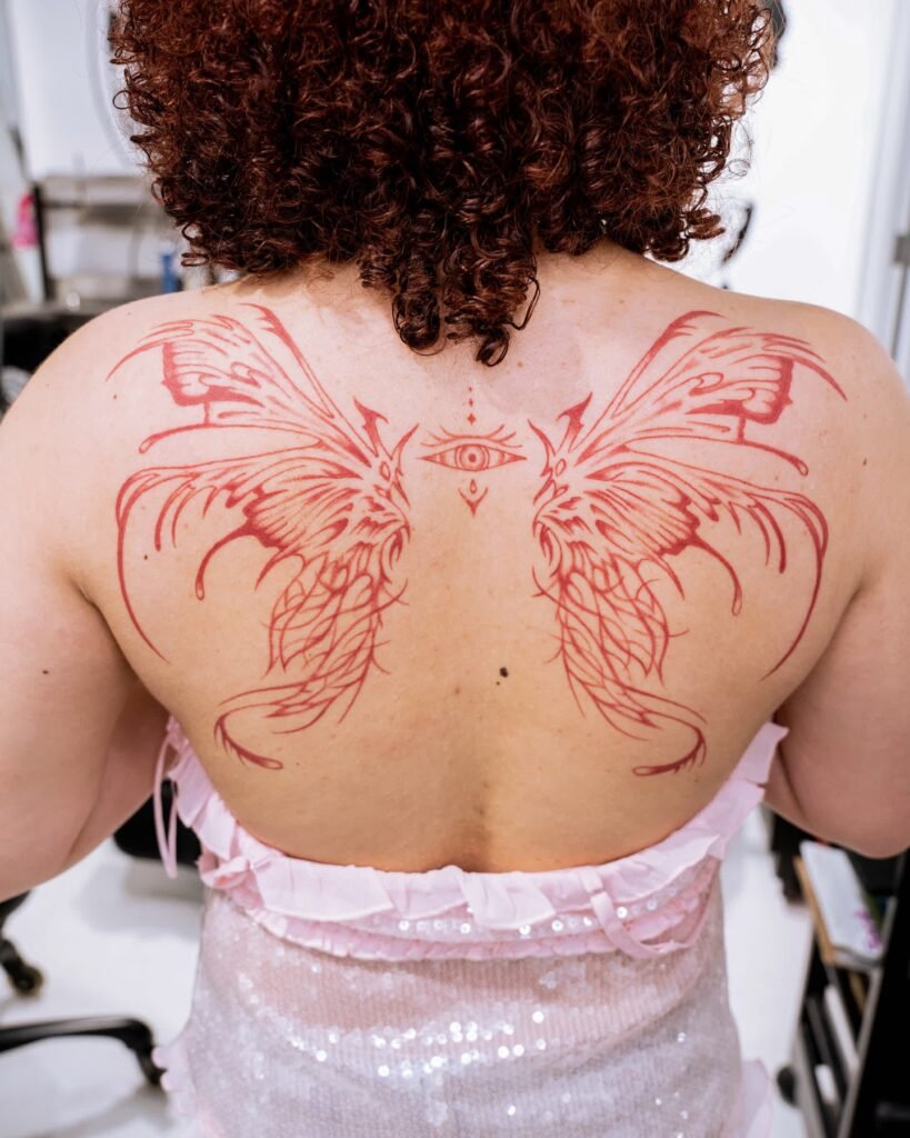 21. Mystic Butterfly Wings with Third Eye Tattoo
