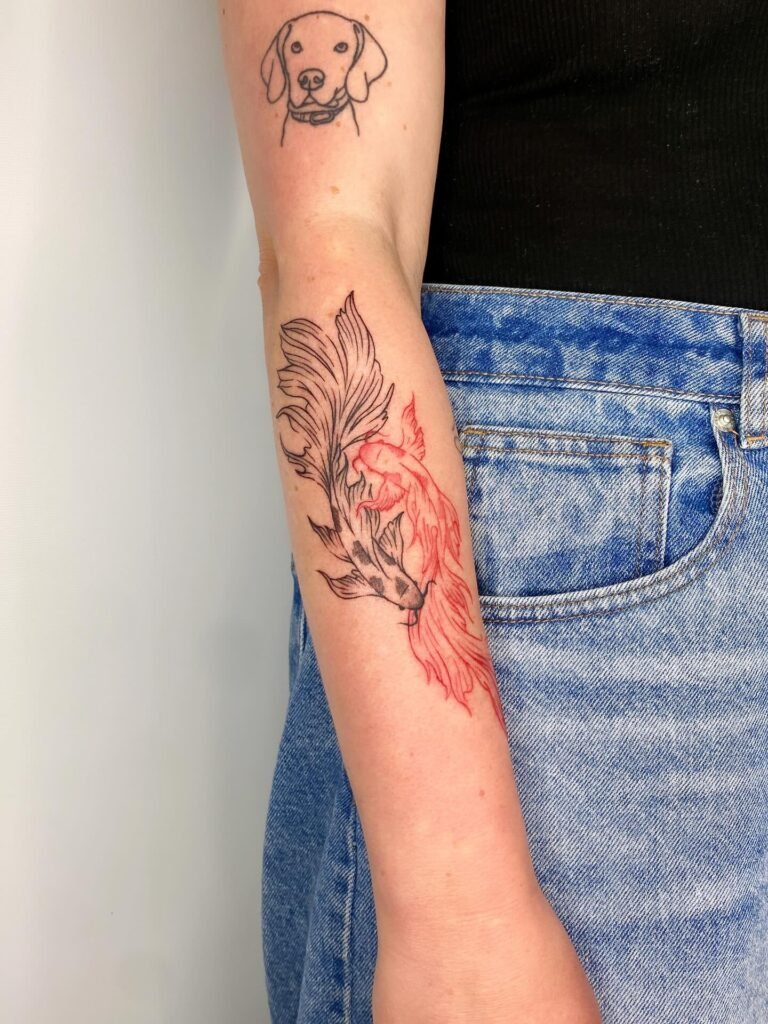6. Two-Tone Betta Fish Tattoo on Forearm