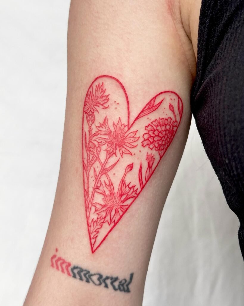 17. Floral Heart Red Ink Tattoo on Arm