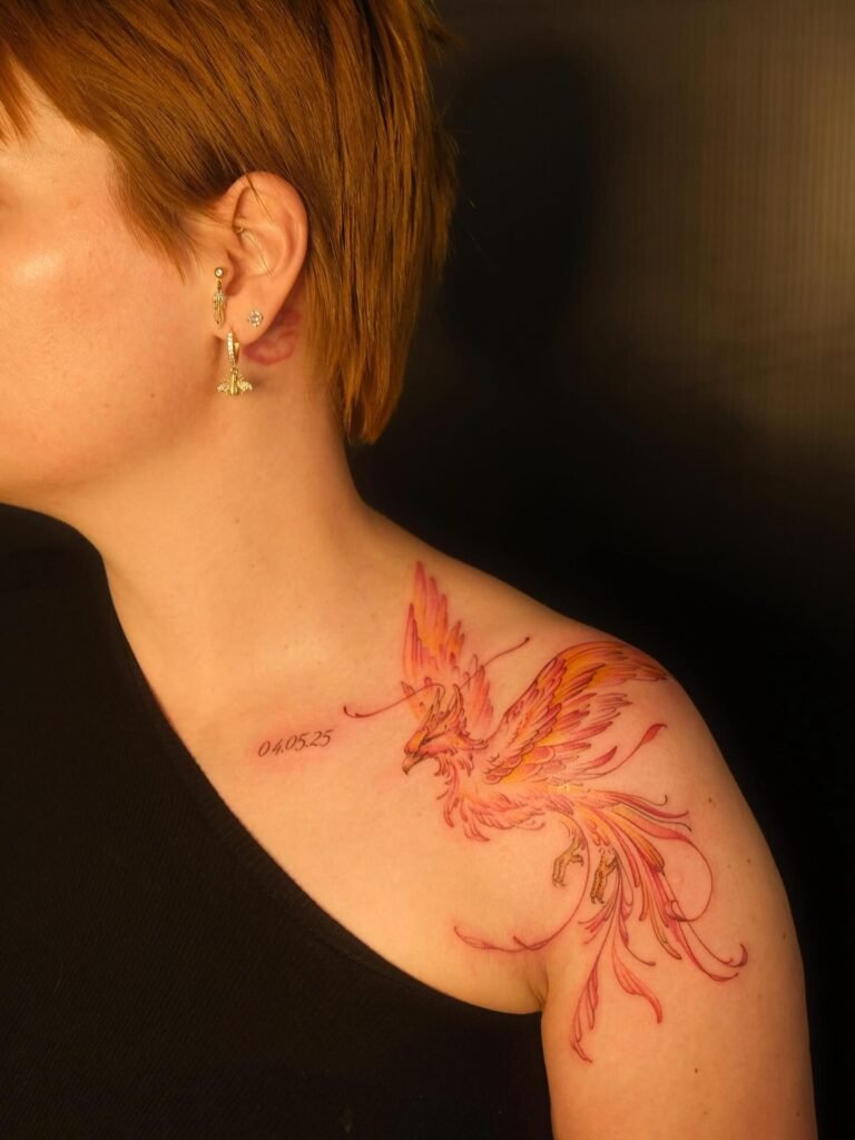 16. Rising Phoenix Red Ink Tattoo with Date