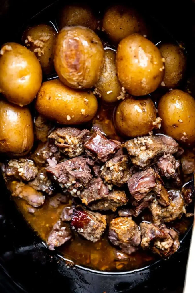 Slow Cooker Steak and Potatoes With Garlic Butter
