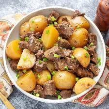 Slow Cooker Steak and Potatoes With Garlic Butter